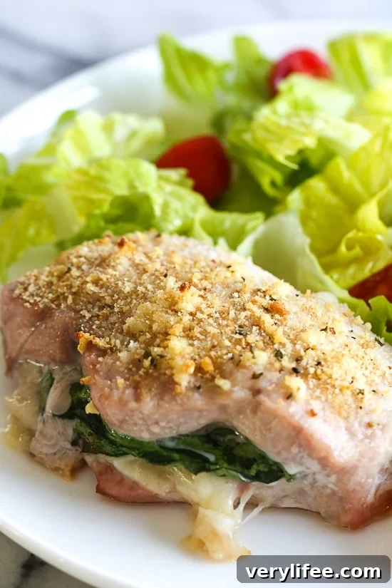 These stuffed pork chops are SO good, inspired my a meal I had at a local Italian restaurant stuffed with prosciutto, mozzarella and baby spinach then topped with garlic and breadcrumbs.