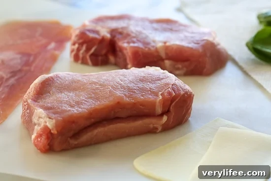 These stuffed pork chops are SO good, inspired my a meal I had a few nights ago at a local Italian restaurant. Stuffed with prosciutto, mozzarella and baby spinach then topped with garlic and breadcrumb. 