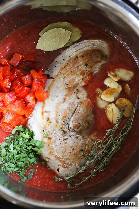A hearty sauce made with Pulled pork, tomatoes, roasted peppers and fresh herbs. Wonderful served over pasta, spaghetti squash or spiralized noodles.
