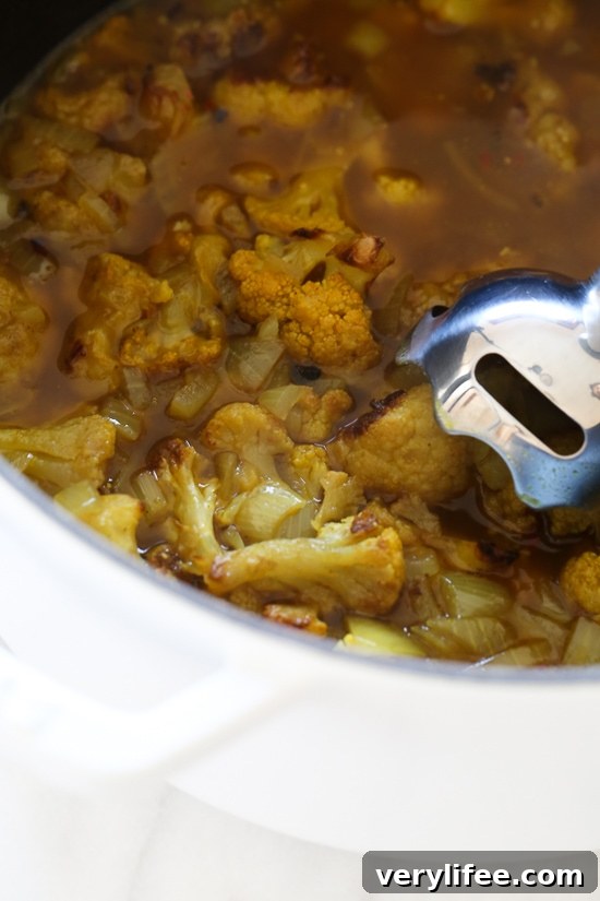 Creamy Turmeric Roasted Cauliflower Soup Recipe 3 Roasting cauliflower enhances the flavors in this delicious, healthy soup. If you haven't jumped on the turmeric bandwagon yet, this soup is a great place to start! I like to reserve some of the roasted cauliflower as a garnish for the soup.