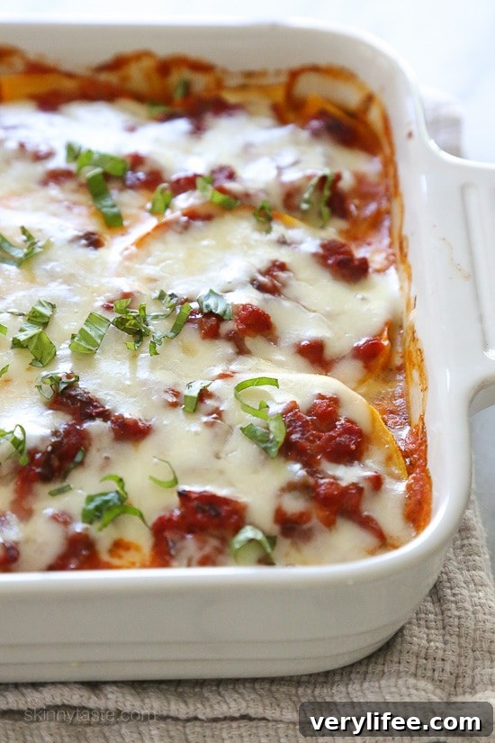 This fall lasagna swaps pasta for butternut squash layered with a chicken sausage meat sauce, ricotta, and mozzarella. Simply wonderful, you won't miss the pasta!