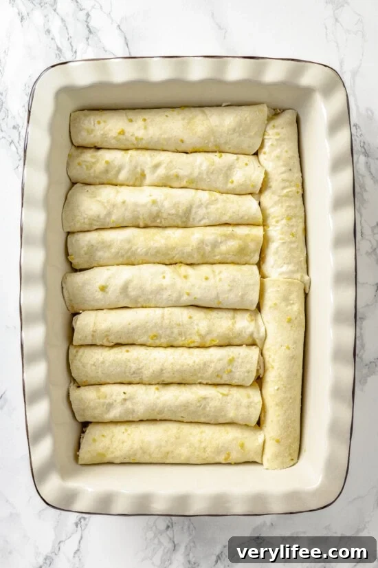 Enchiladas rolled in a baking dish