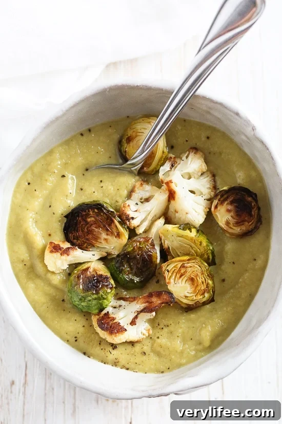 Roasted Brussels Sprouts and Cauliflower Soup: creamy, dairy-free, topped with roasted vegetables for texture