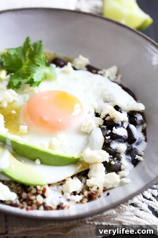 Eggs are not just for breakfast, I love them for lunch or dinner too! This flavorful protein-pack breakfast bowl has a Mexican flair, topped with salsa verde, black beans, avocados and queso fresco.