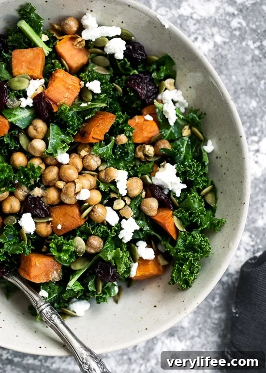 Kale Salad with Roasted Sweet Potato, Dried Cherries, Feta & Pepitas