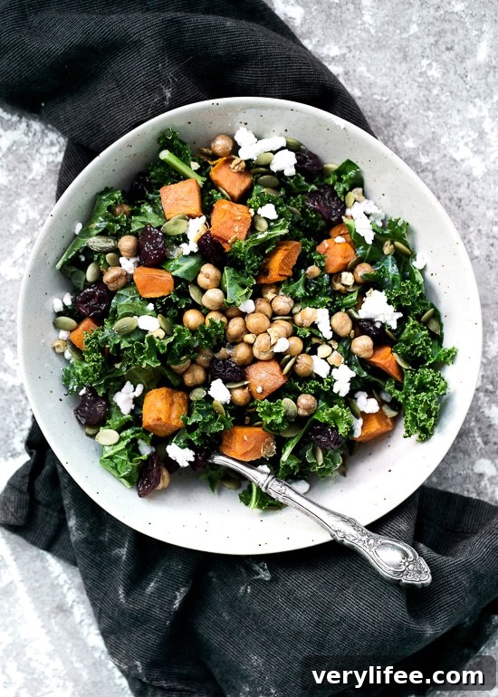 Kale Salad with Roasted Sweet Potato, Dried Cherries, Feta & Pepitas