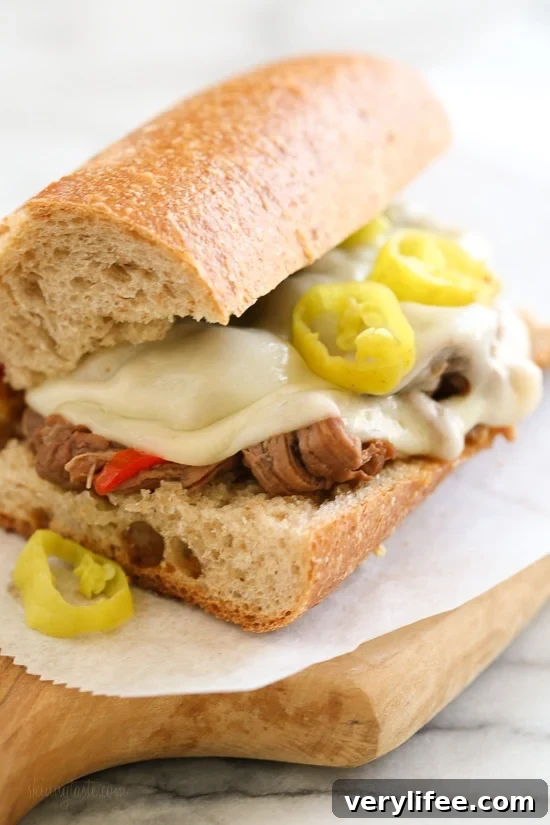 Slow Cooker Italian Beef Hoagies: First Meal in New Home 10 Set it and forget it with this easy slow cooker sandwich recipe! Made with a beef roast, bell peppers, pepperoncini, garlic and dried herbs, served on whole wheat Italian bread or rolls with melted provolone.