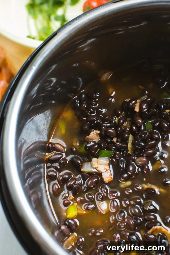 Instant Pot Black Beans Recipe: Tender, Flavorful in 1 Hour 5 Instant Pot black bean ingredients in the pressure cooker