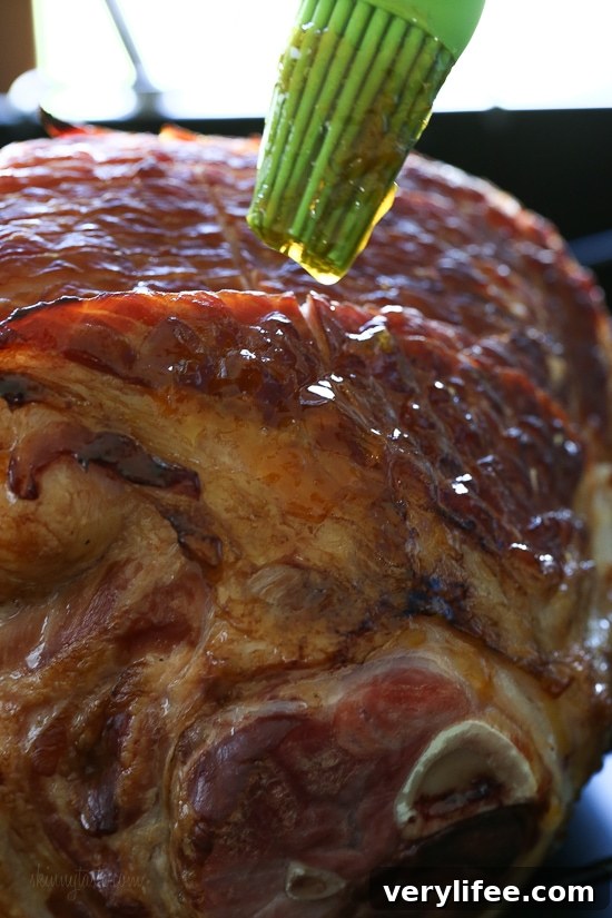 Apricot-Rum Glazed Spiral Ham is perfect for the Holidays, and easy since the ham is already cooked you're basically just heating it up and adding your own glaze.