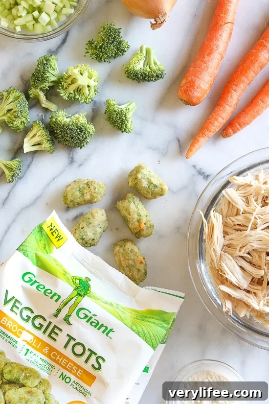 Skillet Chicken and Broccoli Veggie Tot Pie is the ultimate fast and easy, family-friendly, one-pan comfort dish! Made in a skillet with chicken breast, celery, carrots, and broccoli, then finished in the oven with broccoli and cheese veggie tots.