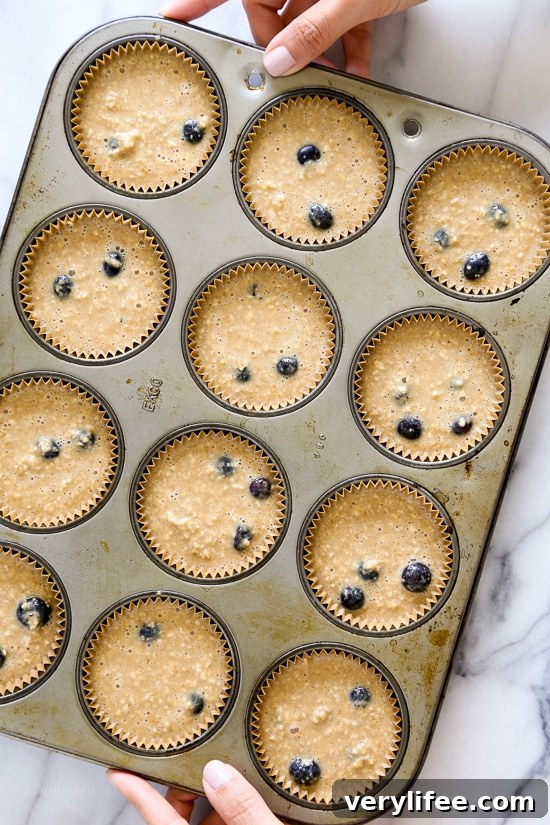 Blueberry Oatmeal Muffins on a cooling rack