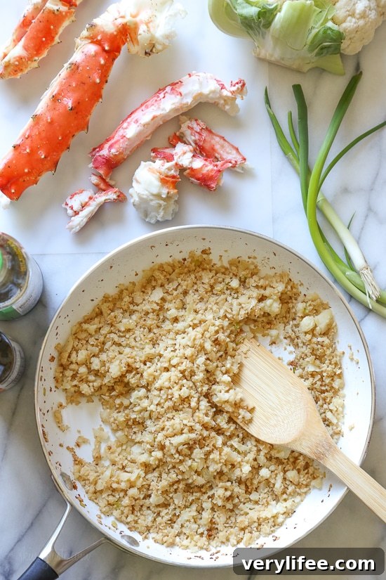 Serving of King Crab cauliflower fried rice