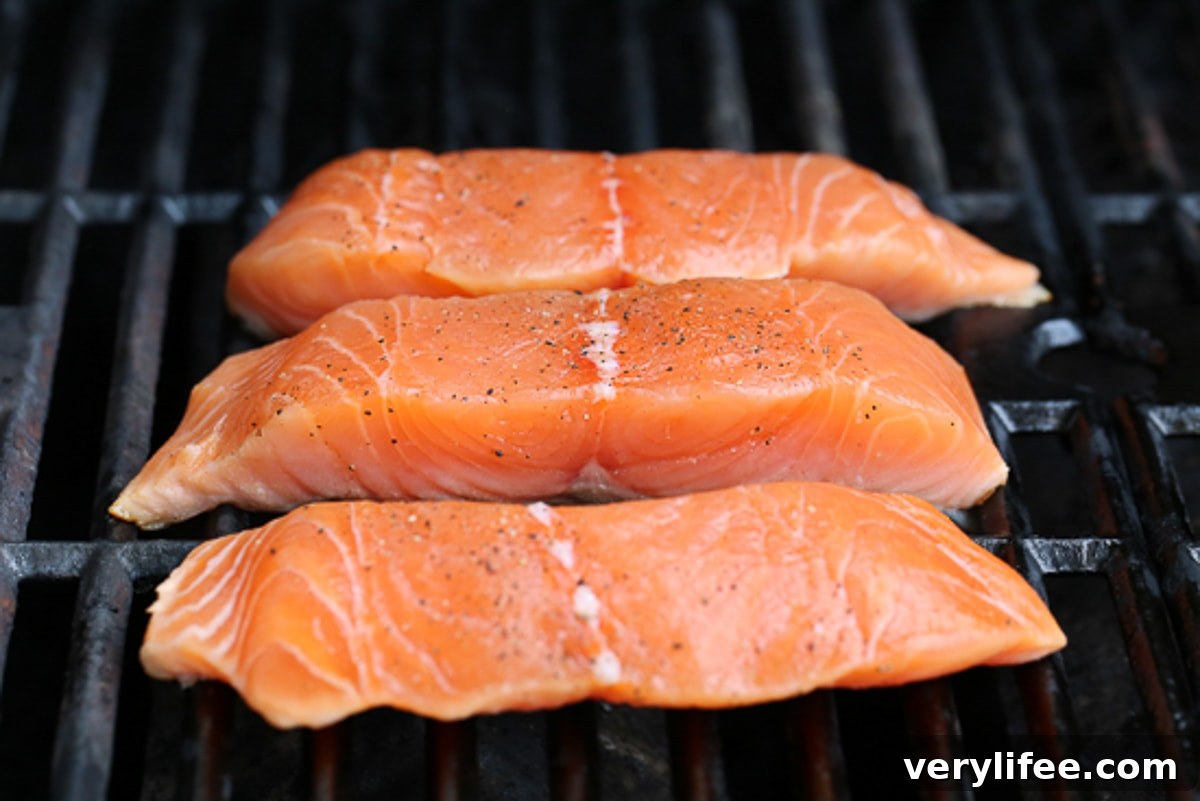 grilling salmon on an outdoor grill
