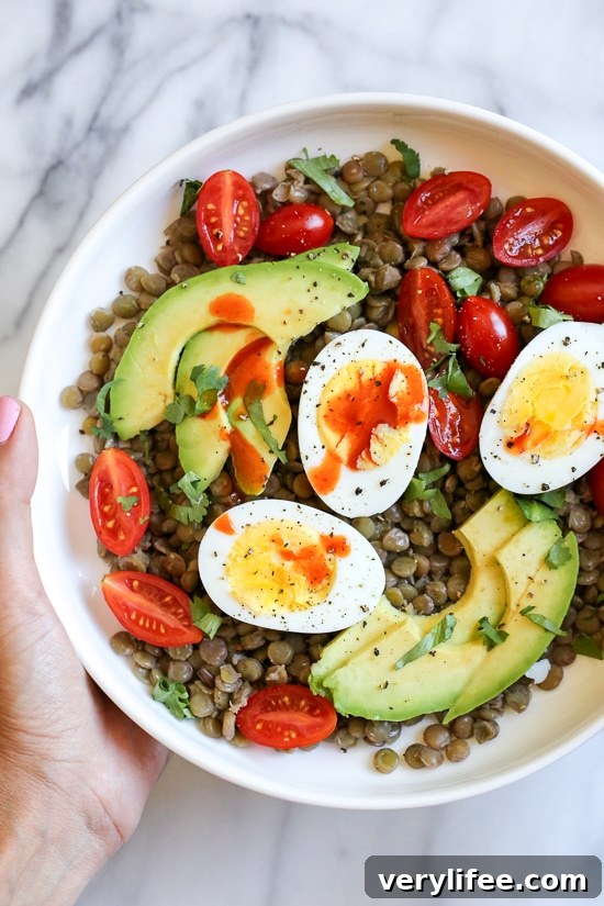 Cholula Lentil Bowl Recipe with Avocado and Eggs 3 Simple lentil bowl with eggs, avocado and tomatoes