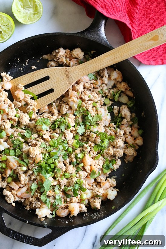 This chicken and shrimp laap or larp is a Laotian version of lettuce wraps. It's low-carb, Paleo-friendly, Whole 30 approved, loaded with flavor and so fast and easy to make!