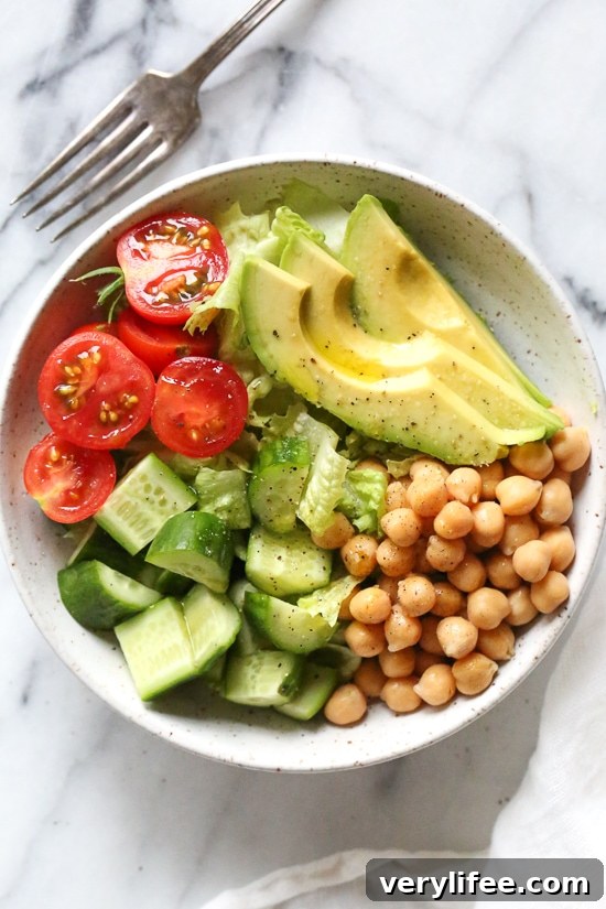 This Chickpea and Avocado salad is my go-to lunch when I need something fast and healthy! I load it up with garden vegetables and top it with a little olive oil and lemon, or olive oil and vinegar depending on my mood. Super simple, fresh and fills me up!
