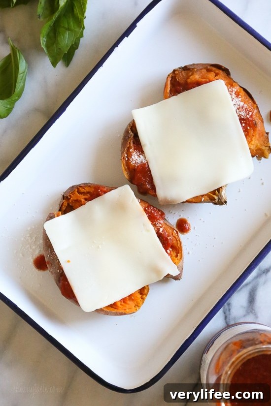 Italian-Style Stuffed Sweet Potatoes with Mozzarella and Basil 6 Baked sweet potato opened and filled with Italian-style toppings.