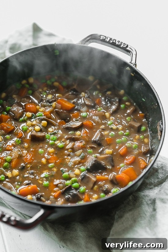 Serving of Portobello Shepherd’s Pie with parsley garnish