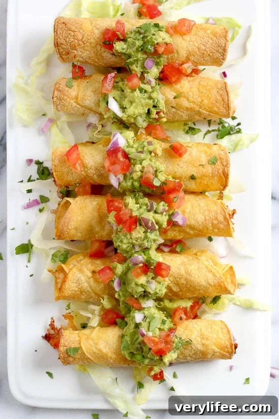 Baked Shrimp Taquitos are so much lighter and healthier than frying, and they come out perfect and crisp! The shrimp filling is SO good you'll be tempted to eat it before you roll them up. I plan on making the filling again to use for shrimp tacos this week!