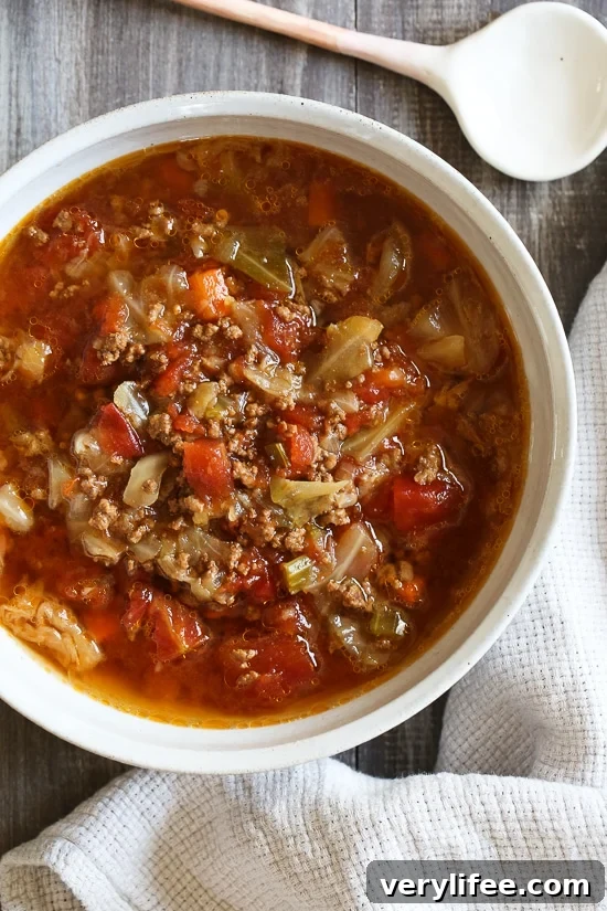 Ground beef, cabbage, vegetables and tomatoes, this is the perfect soup to clean out your fridge! And it's super easy to make.