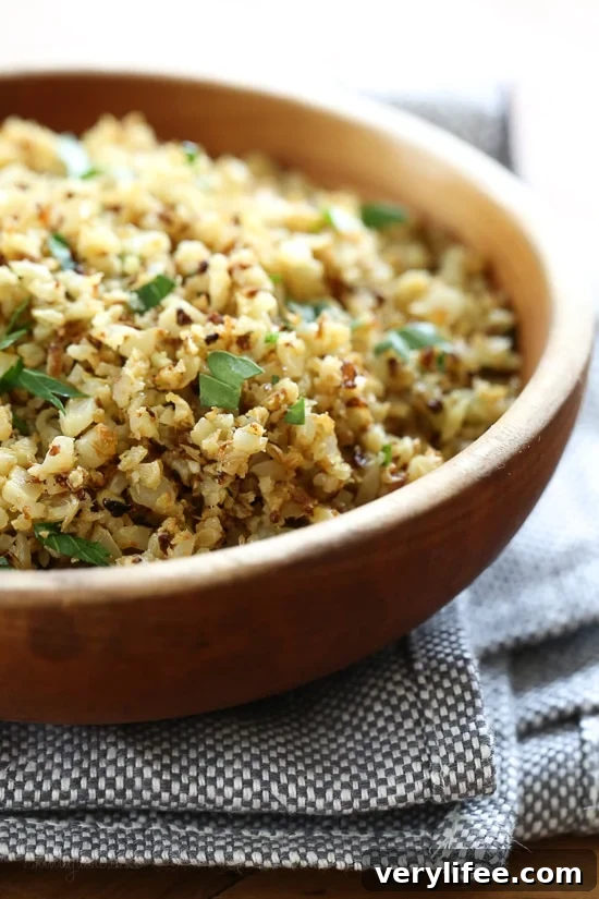 I love cauliflower "rice", and I love roasted cauliflower so I combined the two to make this easy low-carb side dish that goes great with just about anything from chicken, to steak or fish.