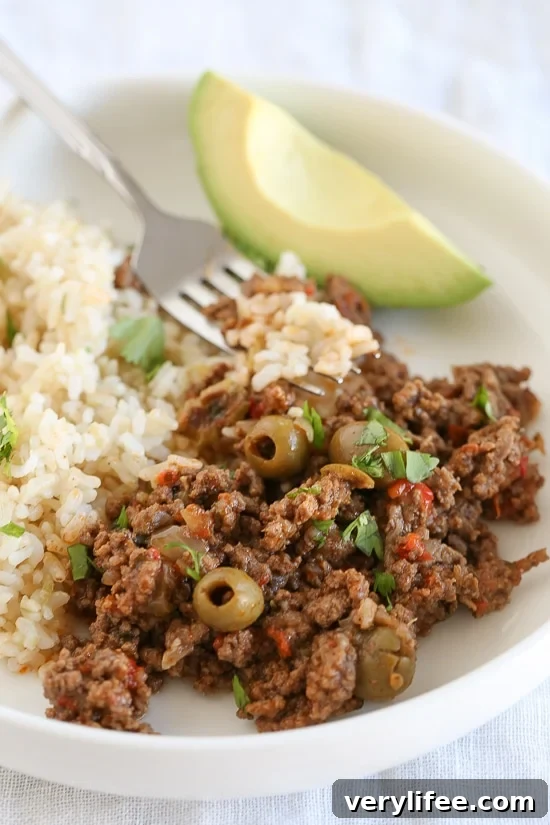 Picadillo is the most requested dish by my kids and it's so easy to make. We love it served over brown rice (or cauliflower rice) with this quick cabbage slaw or a salad on the side.