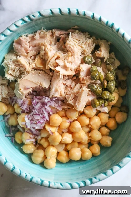 Protein-Packed Chickpea Tuna Salad Recipe 3 Chickpea Tuna Salad with capers is perfect for lunch! Quick and easy for meal prep! Healthy and filling, this mayo-less Tuna Salad is loaded with protein and Omega 3s and tastes even better the next day.