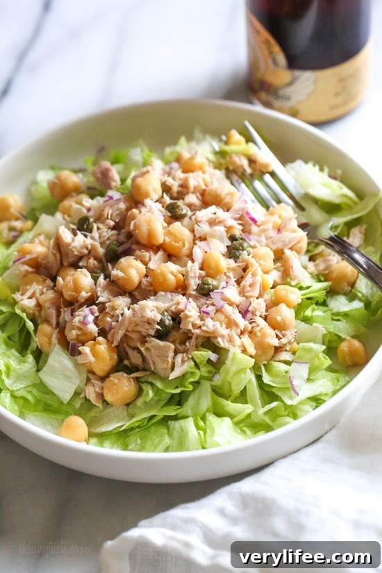 Chickpea Tuna Salad with capers is perfect for lunch! Quick and easy for meal prep! Healthy and filling, this mayo-less Tuna Salad is loaded with protein and Omega 3s and tastes even better the next day.