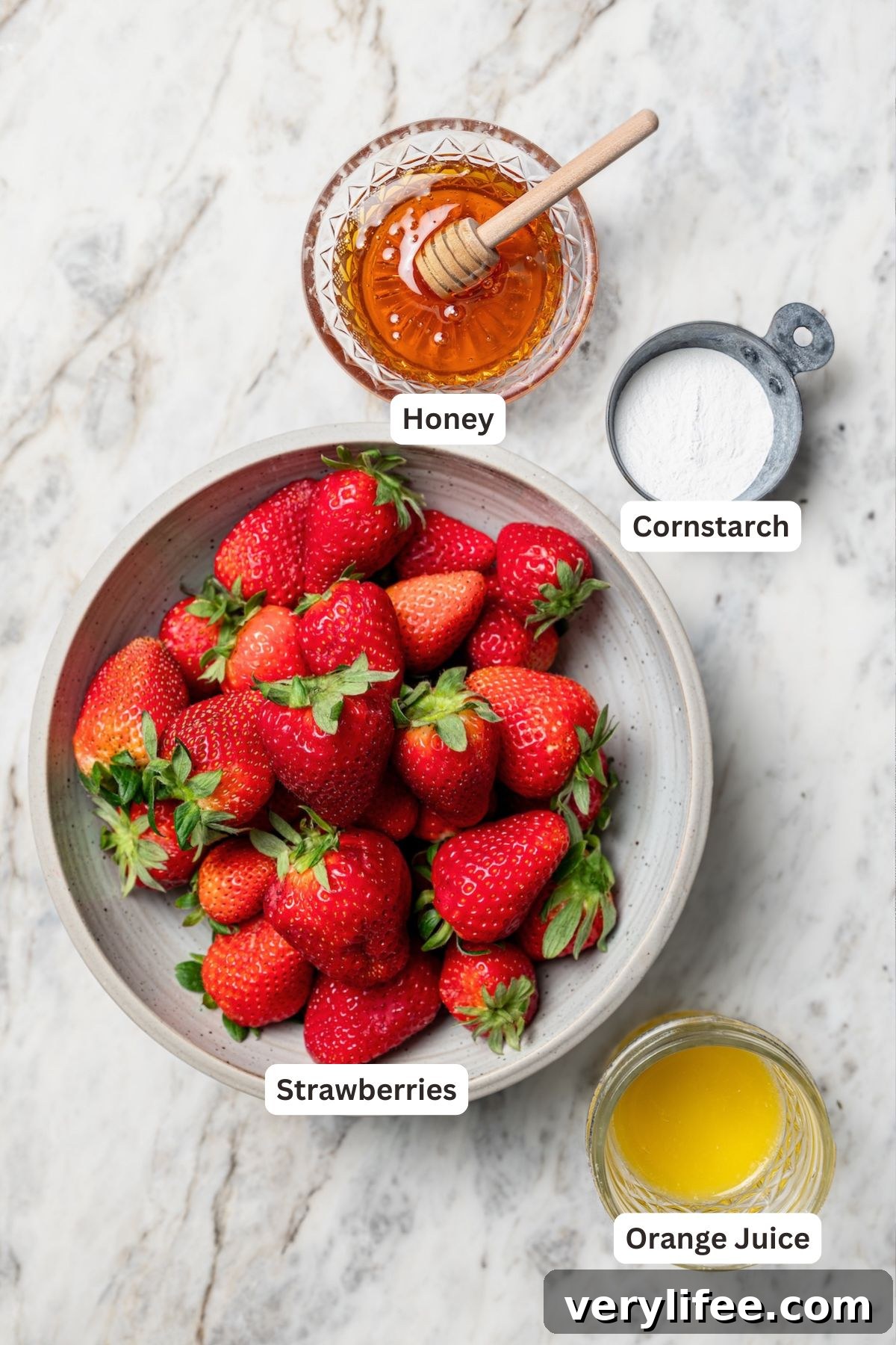 Homemade Strawberry Crisp Recipe with Oat Streusel 3 Overhead view of ingredients for strawberry crisp filling