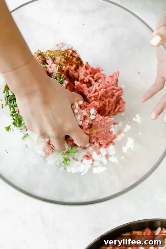 Moroccan Kefta Meatballs made with tomatoes and olives are simmered together in the slow cooker or Instant Pot in this easy and exotic Moroccan dinner.