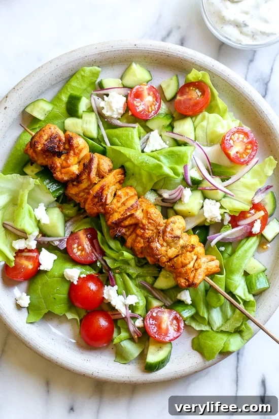 Spiced Chicken Shawarma Kebab Salad Recipe 4 Close up of chicken shawarma pieces on skewers.