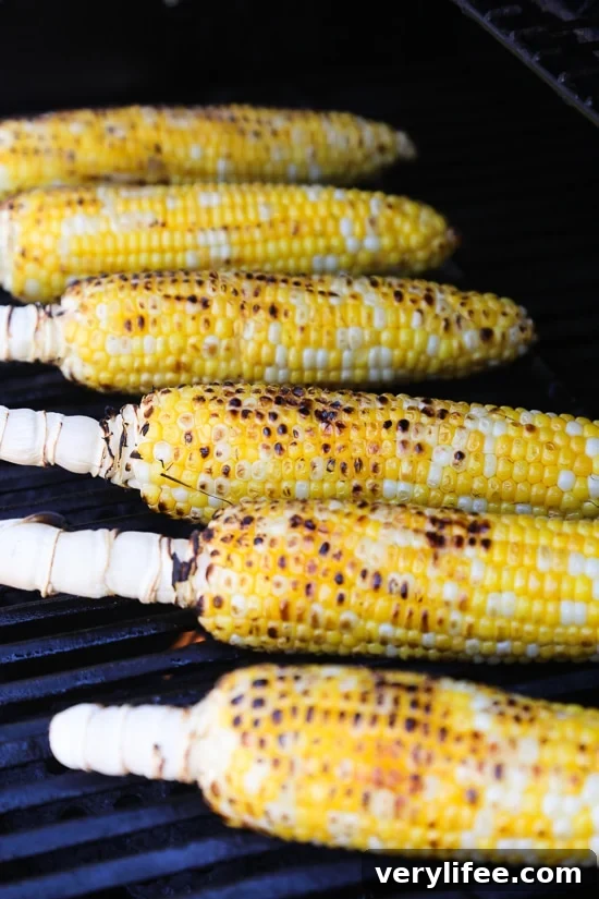 Grilled corn kernels mixed with herbs and feta