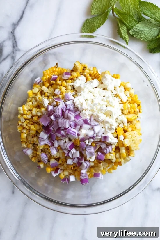 Grilled corn salad plated as a simple summer side