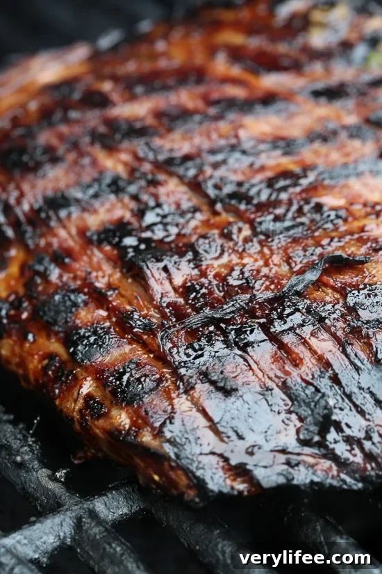 Soy-Marinated Flank Steak Recipe 3 The marinade in this Grilled Asian-style Soy Marinated Flank Steak takes an uninteresting piece of steak and turns it into a mouthwatering dish!