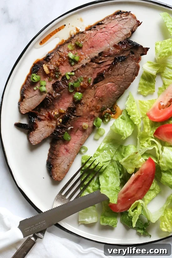 Soy-Marinated Flank Steak Recipe 4 The marinade in this Grilled Asian-style Soy Marinated Flank Steak takes an uninteresting piece of steak and turns it into a mouthwatering dish!