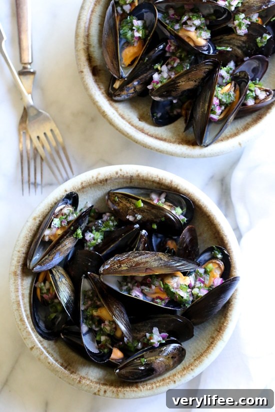 Spicy Piri Piri Steamed Mussels Recipe 4 Steamed mussels get a kick with spicy Piri Piri Sauce which is basically a kicked up chimichurri sauce.