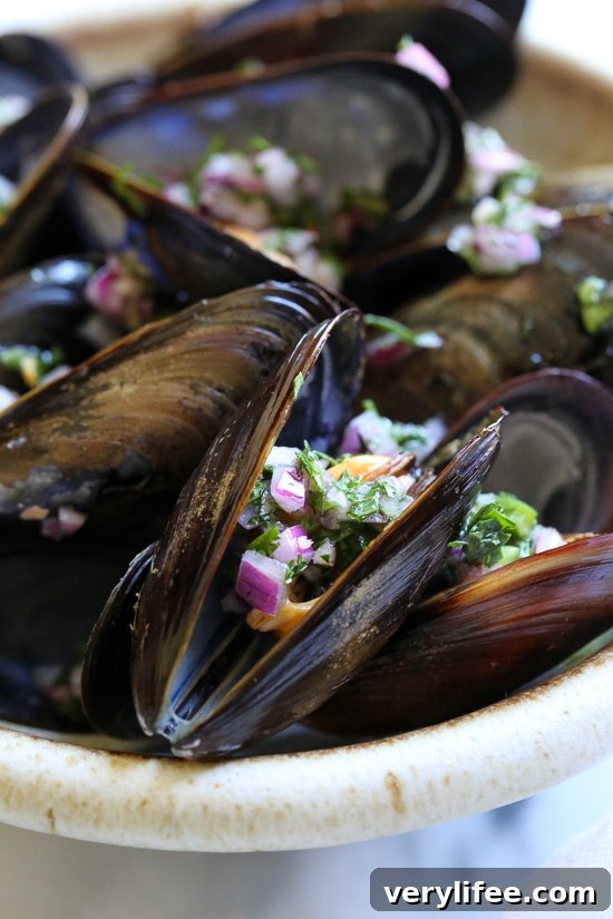 Spicy Piri Piri Steamed Mussels Recipe 6 Steamed mussels get a kick with spicy Piri Piri Sauce which is basically a kicked up chimichurri sauce.
