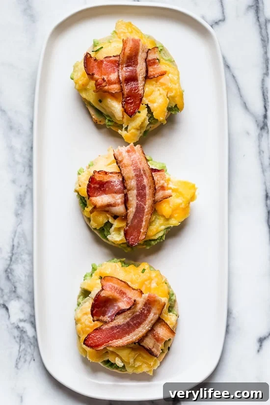 Bacon, egg and avocado on a bagel is my favorite breakfast sandwich made with scrambled eggs, center cut bacon and sliced tomatoes on my homemade bagels.