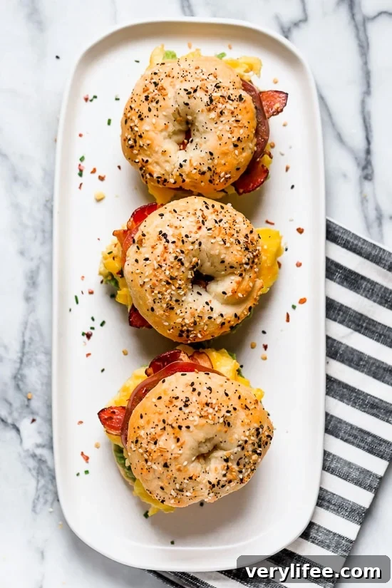 Bacon, egg and avocado on a bagel is my favorite breakfast sandwich made with scrambled eggs, center cut bacon and sliced tomatoes on my homemade bagels.