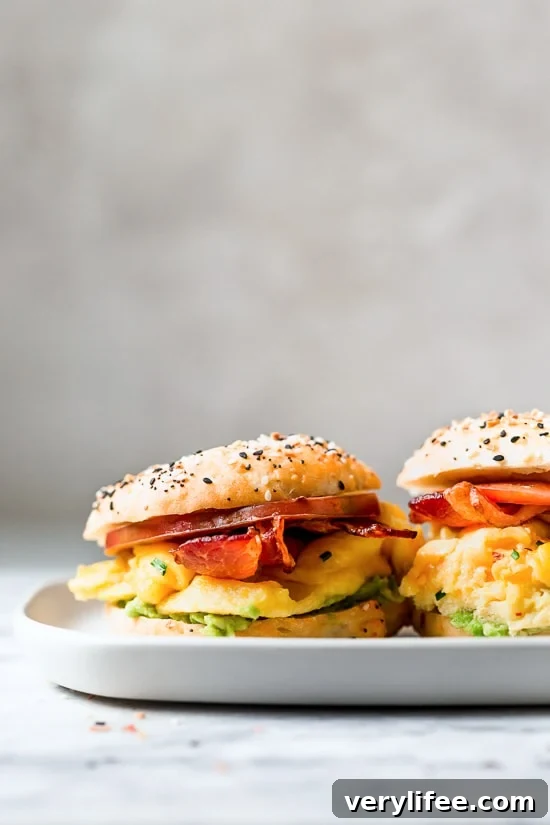 Bacon, egg and avocado on a bagel is my favorite breakfast sandwich made with scrambled eggs, center cut bacon and sliced tomatoes on my homemade bagels.