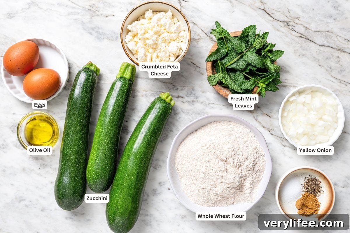 Ingredients for zucchini fritters with feta and mint.