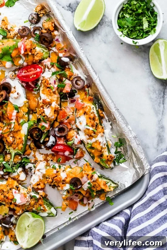 Jalapeno Poppers meet Nachos in this fun, low-carb twist on two classic appetizers, perfect for sharing with your friends this SUPERBOWL!