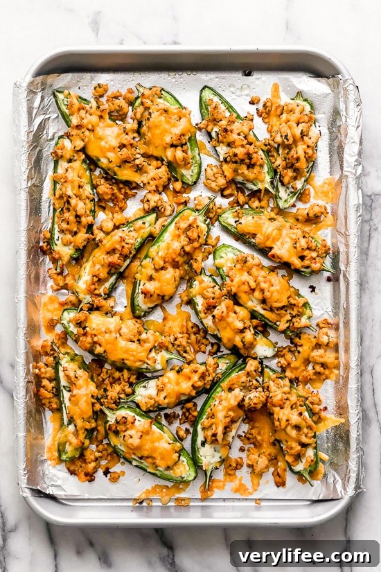 Jalapeno Poppers meet nachos in this fun, low-carb twist of two classic appetizers, perfect for sharing!