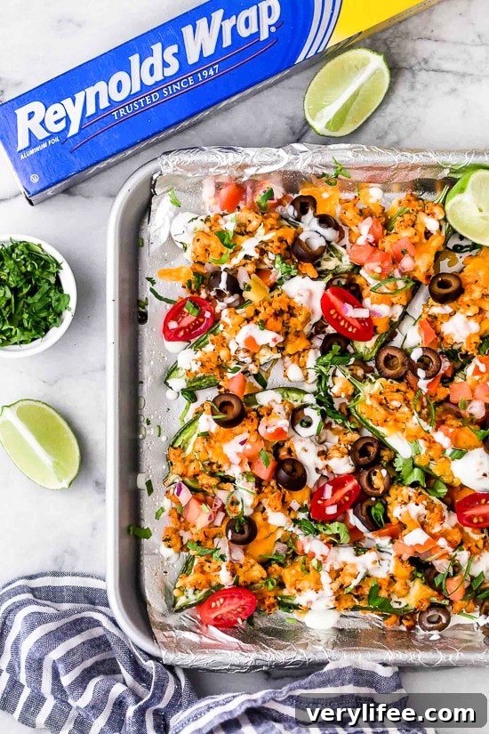 Jalapeno Poppers meet nachos in this fun, low-carb twist of two classic appetizers, perfect for sharing!
