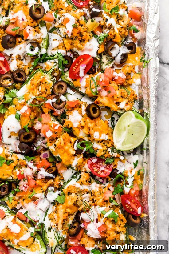 Jalapeno Poppers meet nachos in this fun, low-carb twist of two classic appetizers, perfect for sharing!