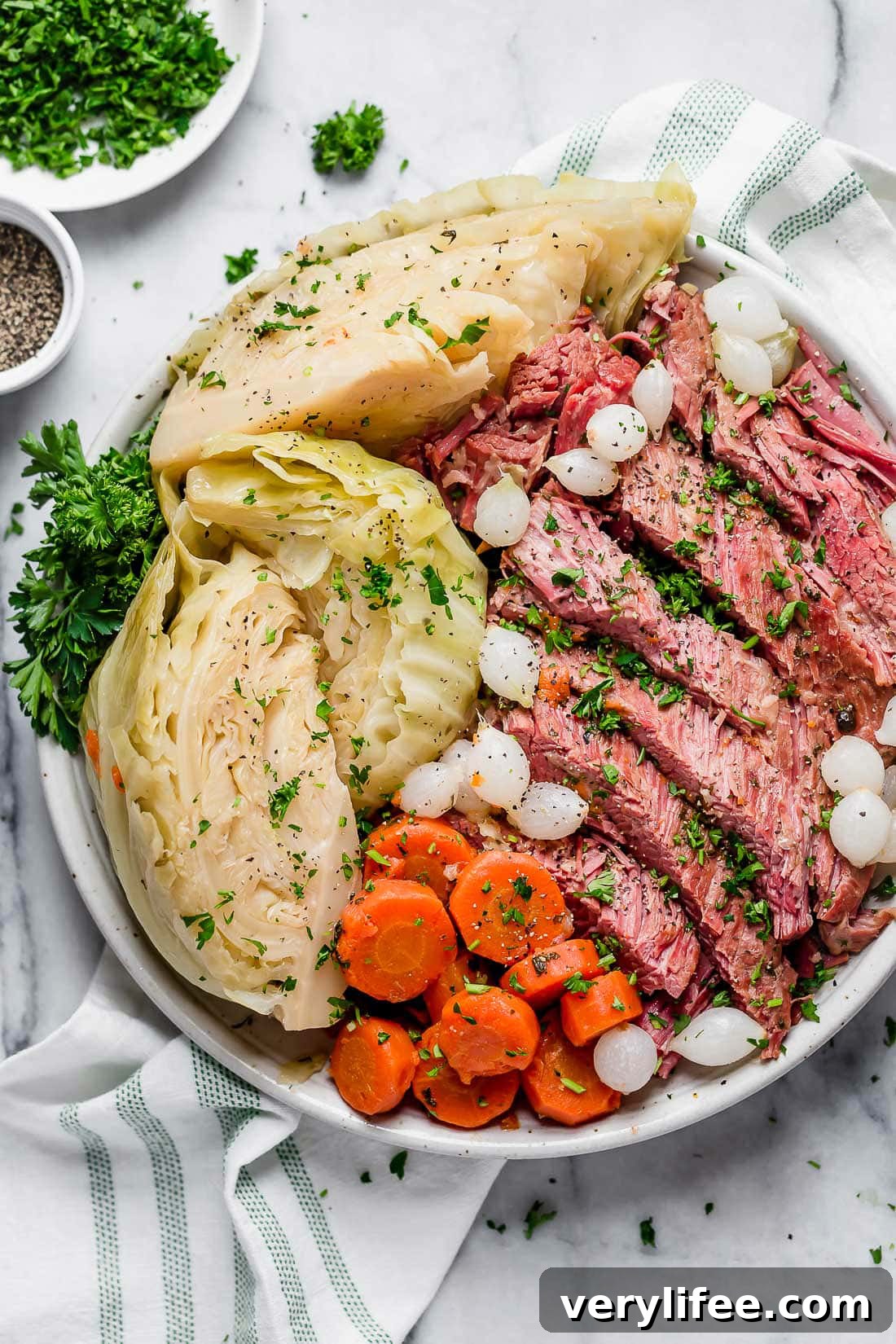 A plate of sliced corned beef and cabbage