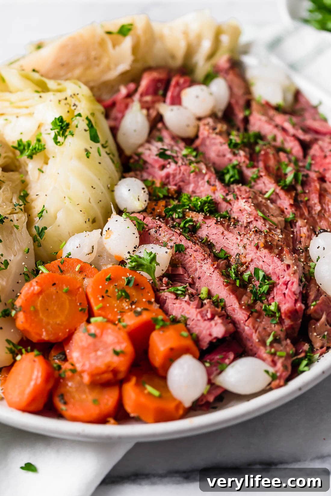 A plate of corned beef and cabbage