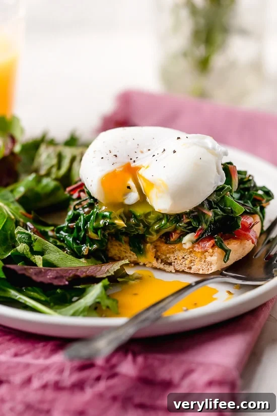 Swiss Chard Eggs Benedict — Canadian bacon, sautéed chard and poached eggs on a whole wheat English muffin