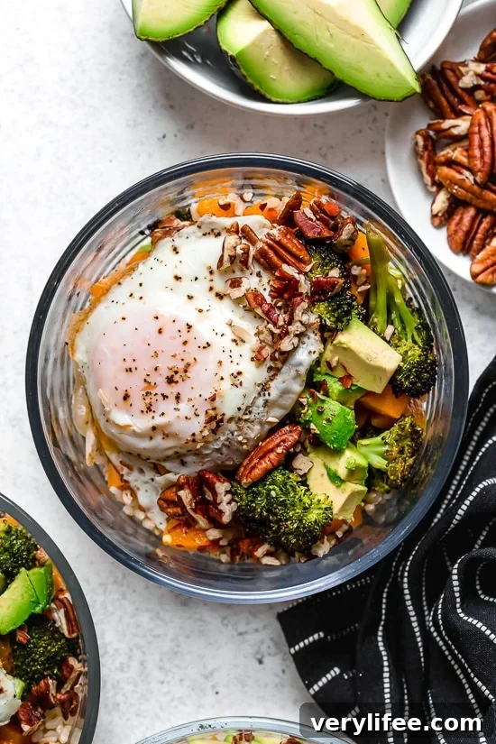 Buddha bowl with fried egg Overhead view of Buddha bowl with fried egg