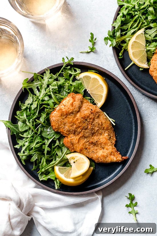 Crispy Air Fryer Chicken Milanese with Baby Arugula 4 Air Fryer Chicken Milanese plated